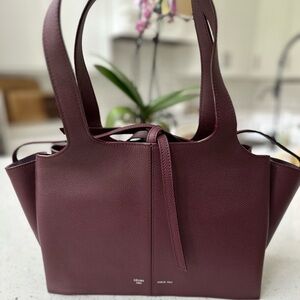 Celine all leather bag NEVER BEEN USED. Burgundy color. 12” base by 9” tall.